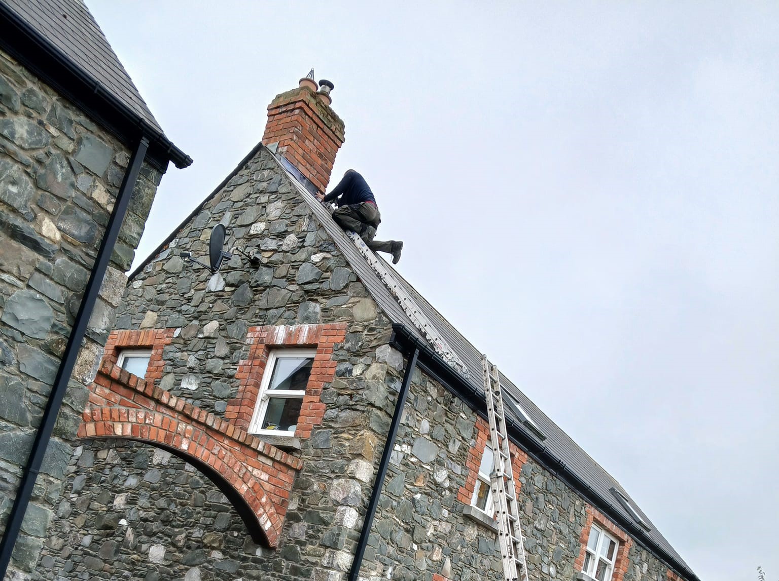 chimney being repaired by our team in Dublin. Photo of the flashing around the chimney.