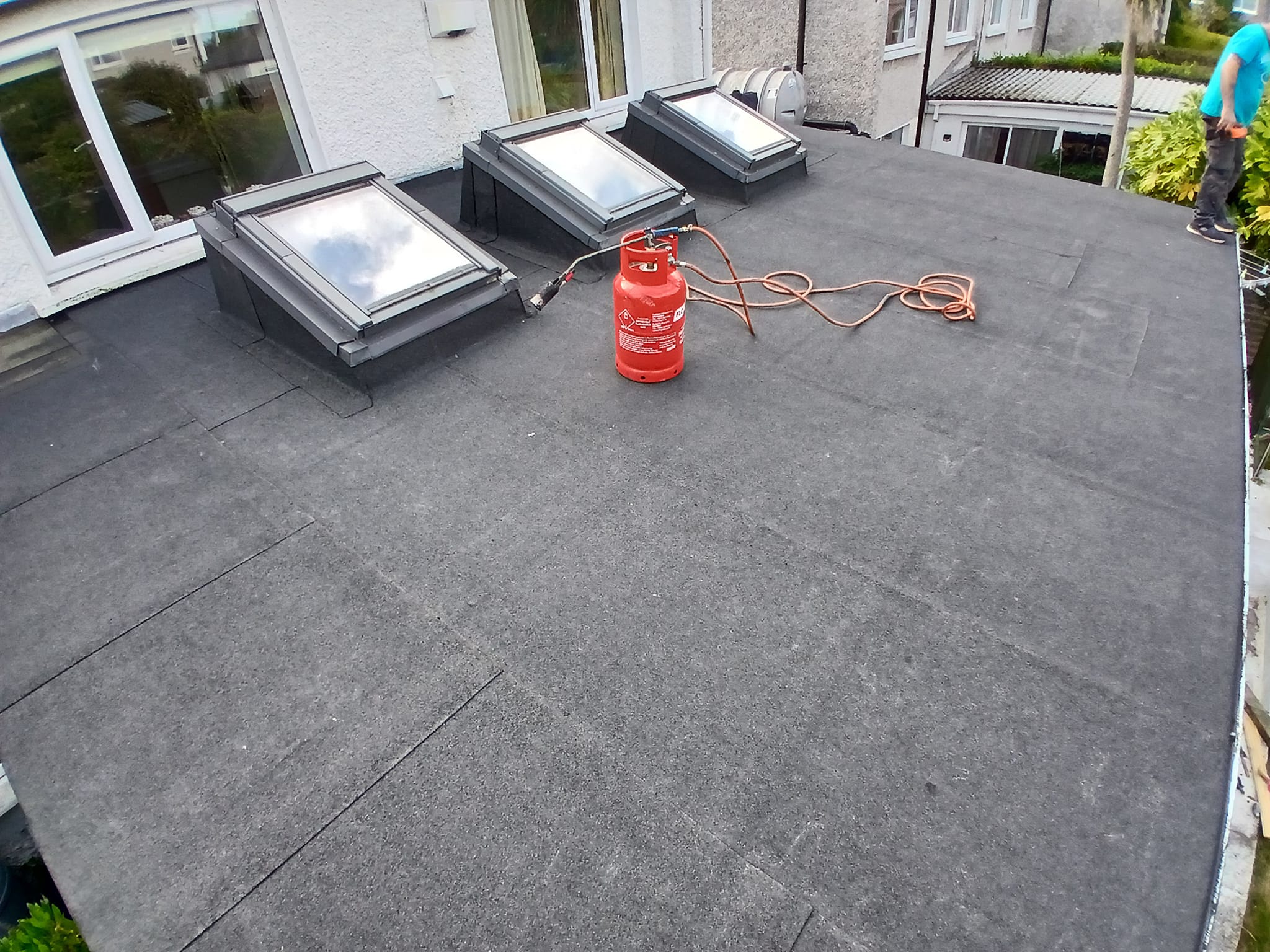 Flat roof membrane after being replaced