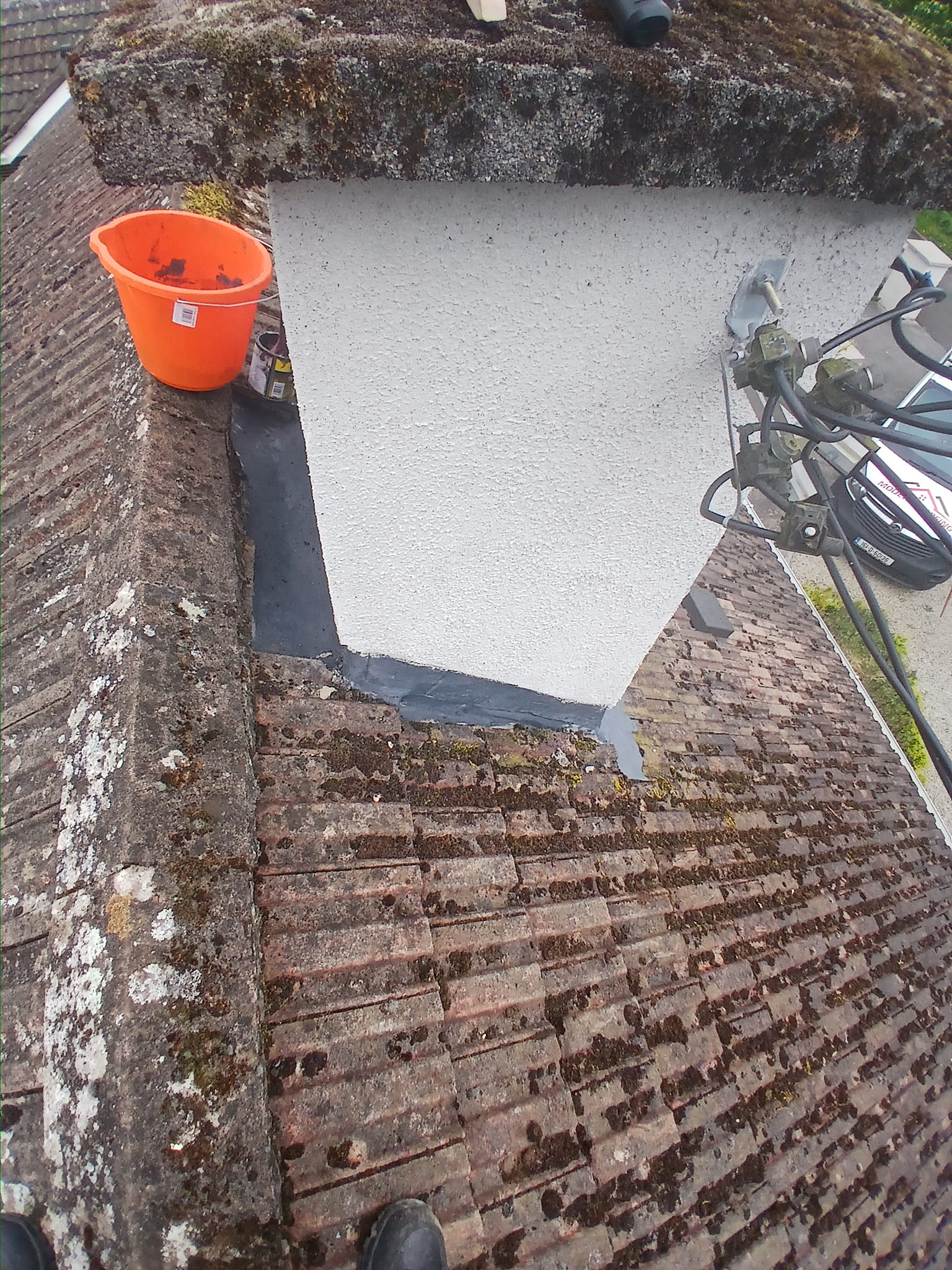 image of a chimney in Dublin city with rubber coating and lead applied to waterproof it.