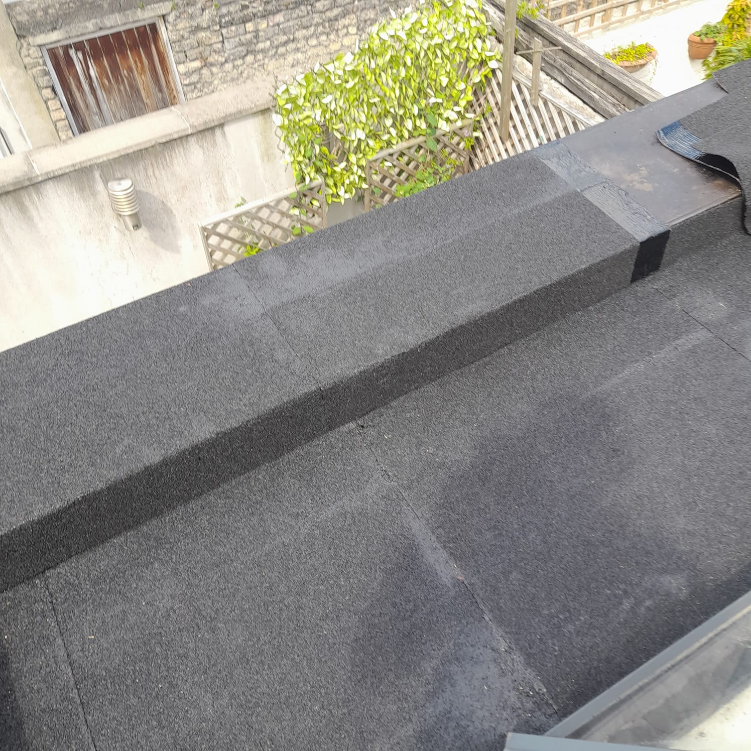 New roof felt after being applied to a flat roof in Dublin