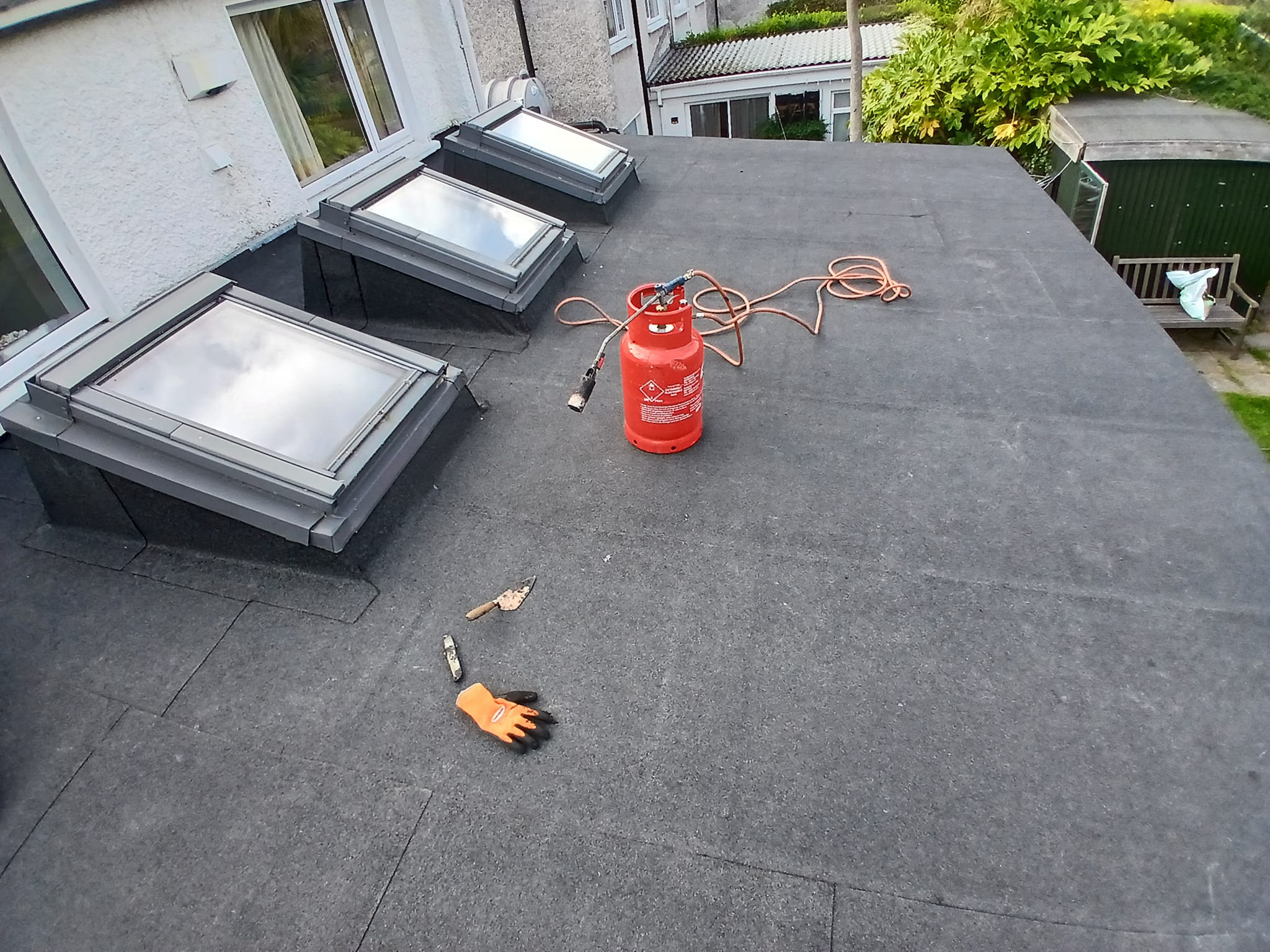 skylight on a flat roof being resealed in Dublin