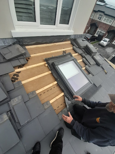 skylight with the tiles removed from around it being repaired in Dublin